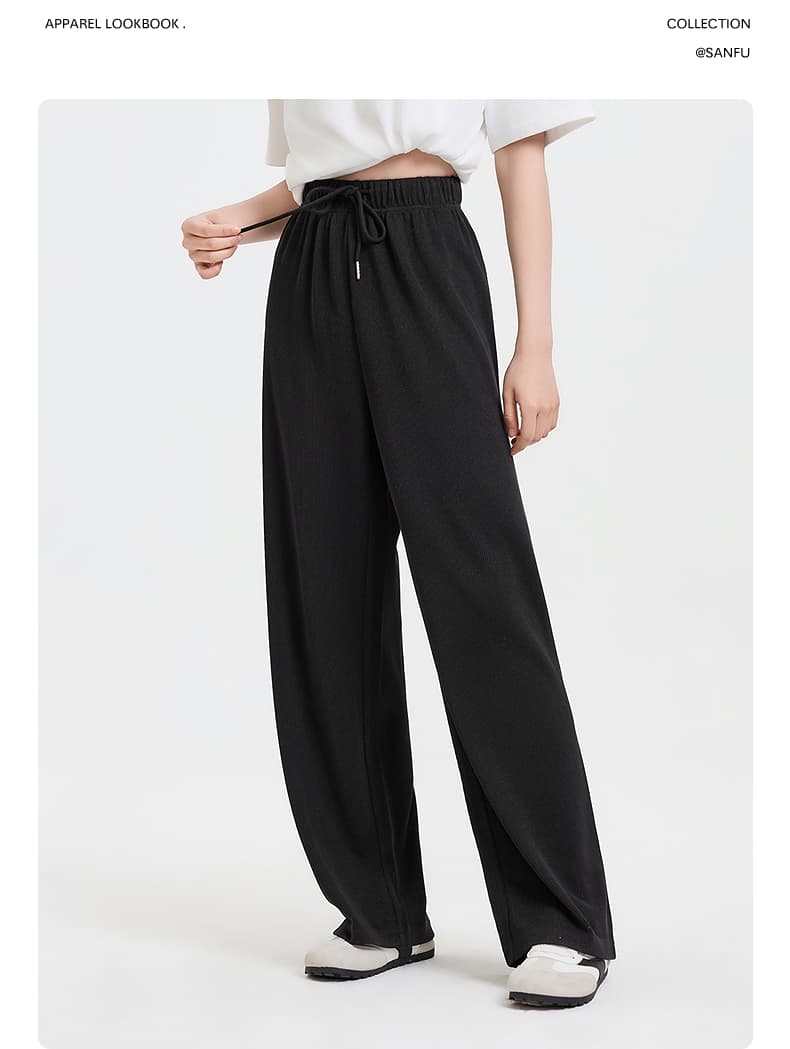 黒パンツ 楽ちん落ち感ドローコードワイドパンツ